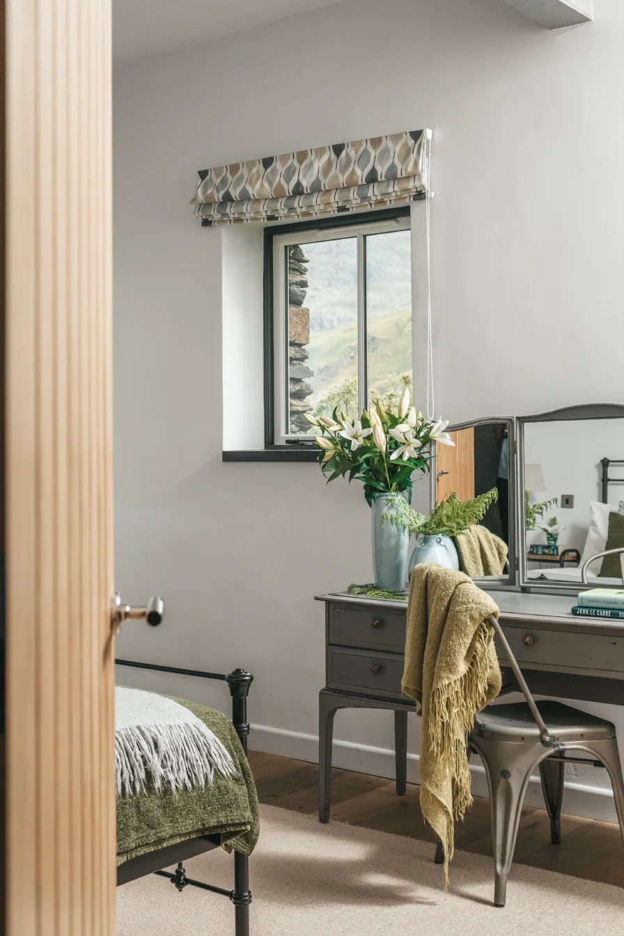 Bedroom vanity with mountain views